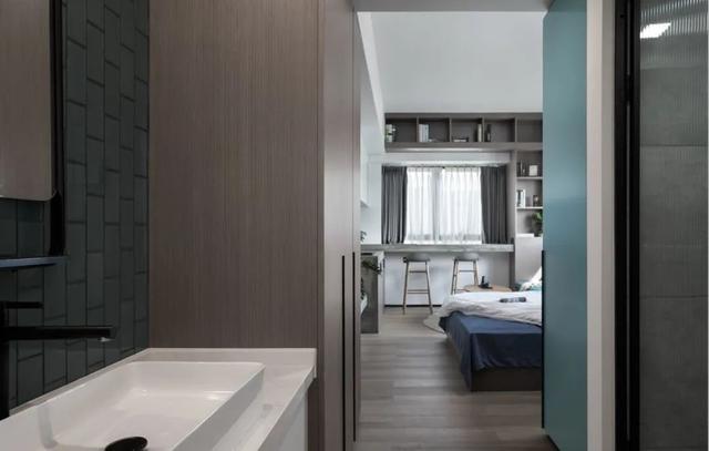 酒店公寓裝修效果圖(35㎡酒店式開間單身公寓，半平米都沒浪費(fèi)，還裝得很有檔次)(圖2)